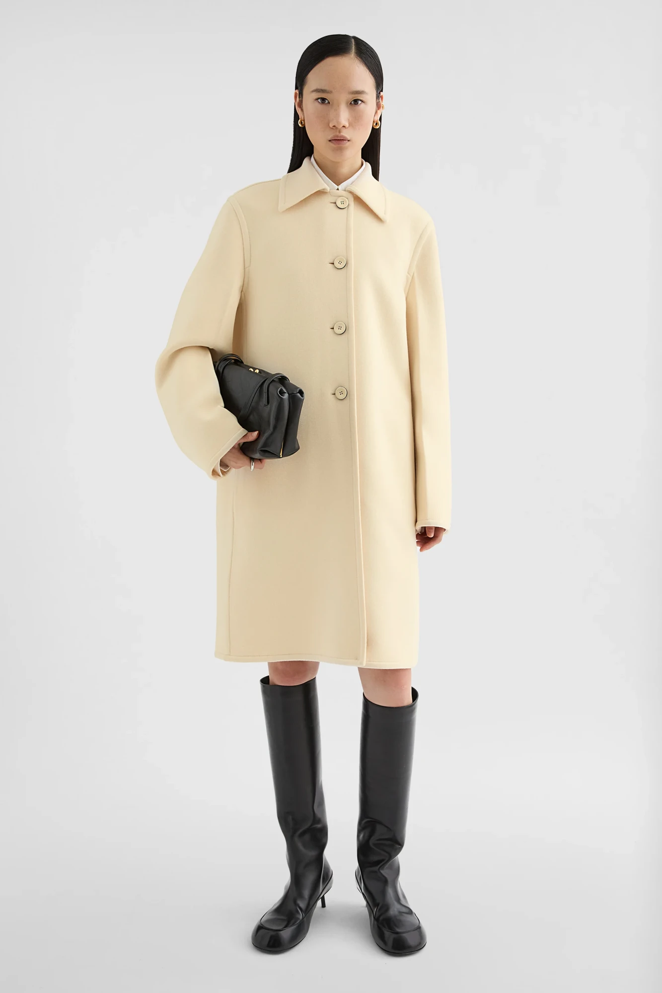 Тренч та чоботи Jil Sander