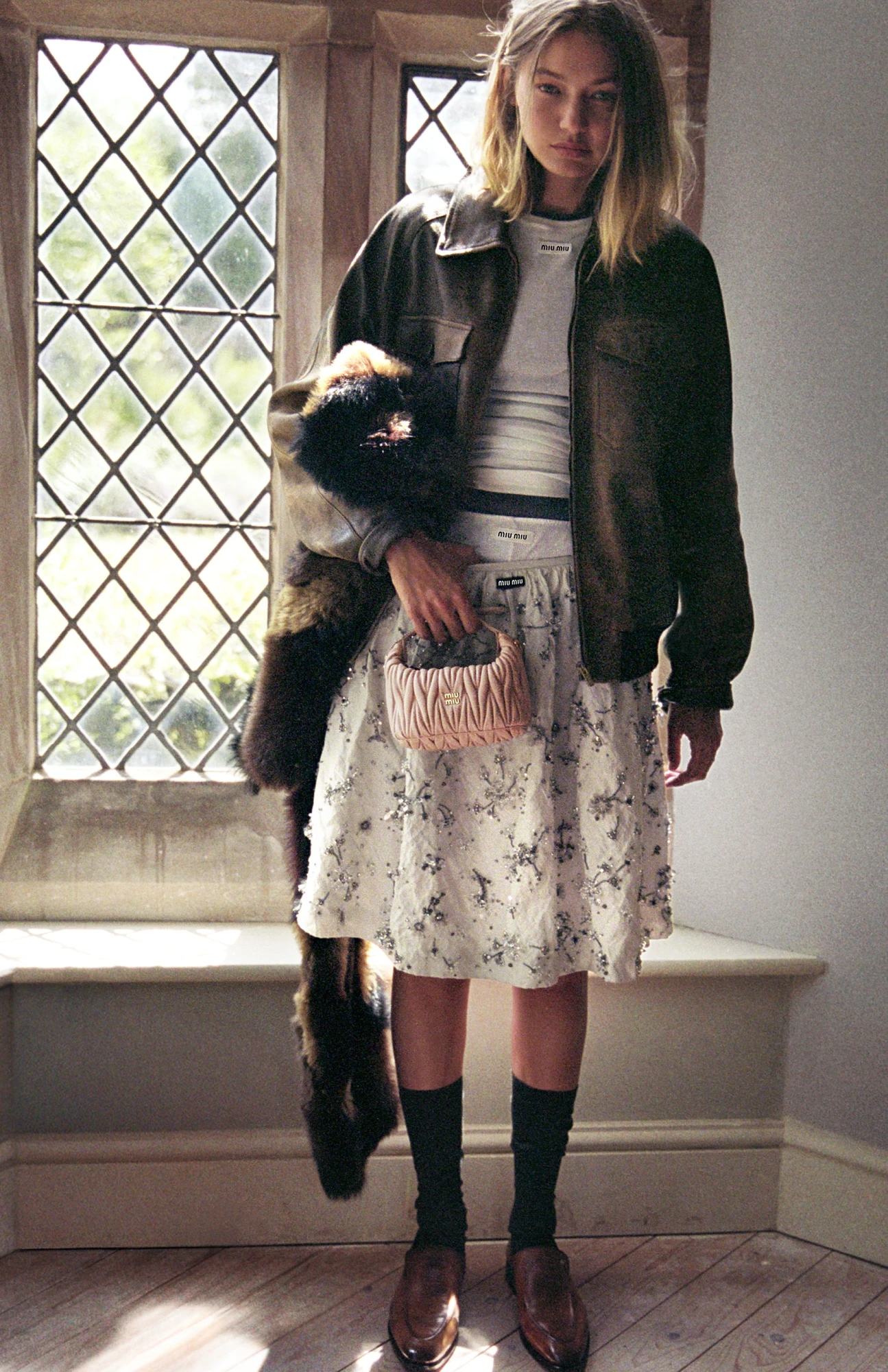 Святкова рекламна кампанія Miu Miu 2025